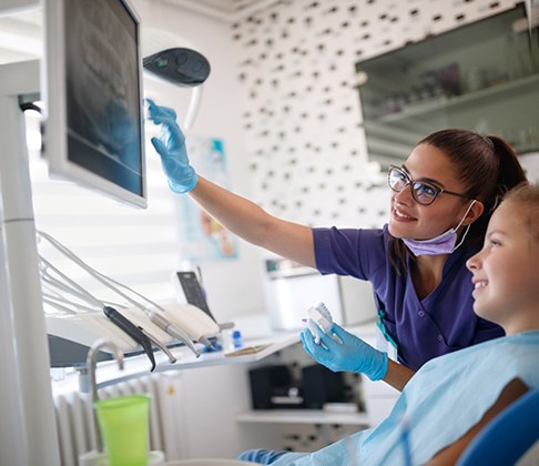 a person getting their teeth polished