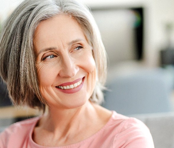 Woman with dentures in Sachse 