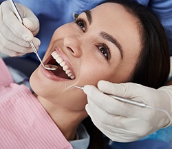 Woman smiling during dental checkup