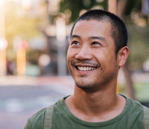 Man sharing healthy smile after tooth extractions