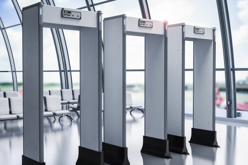 Several metal detectors in an airport